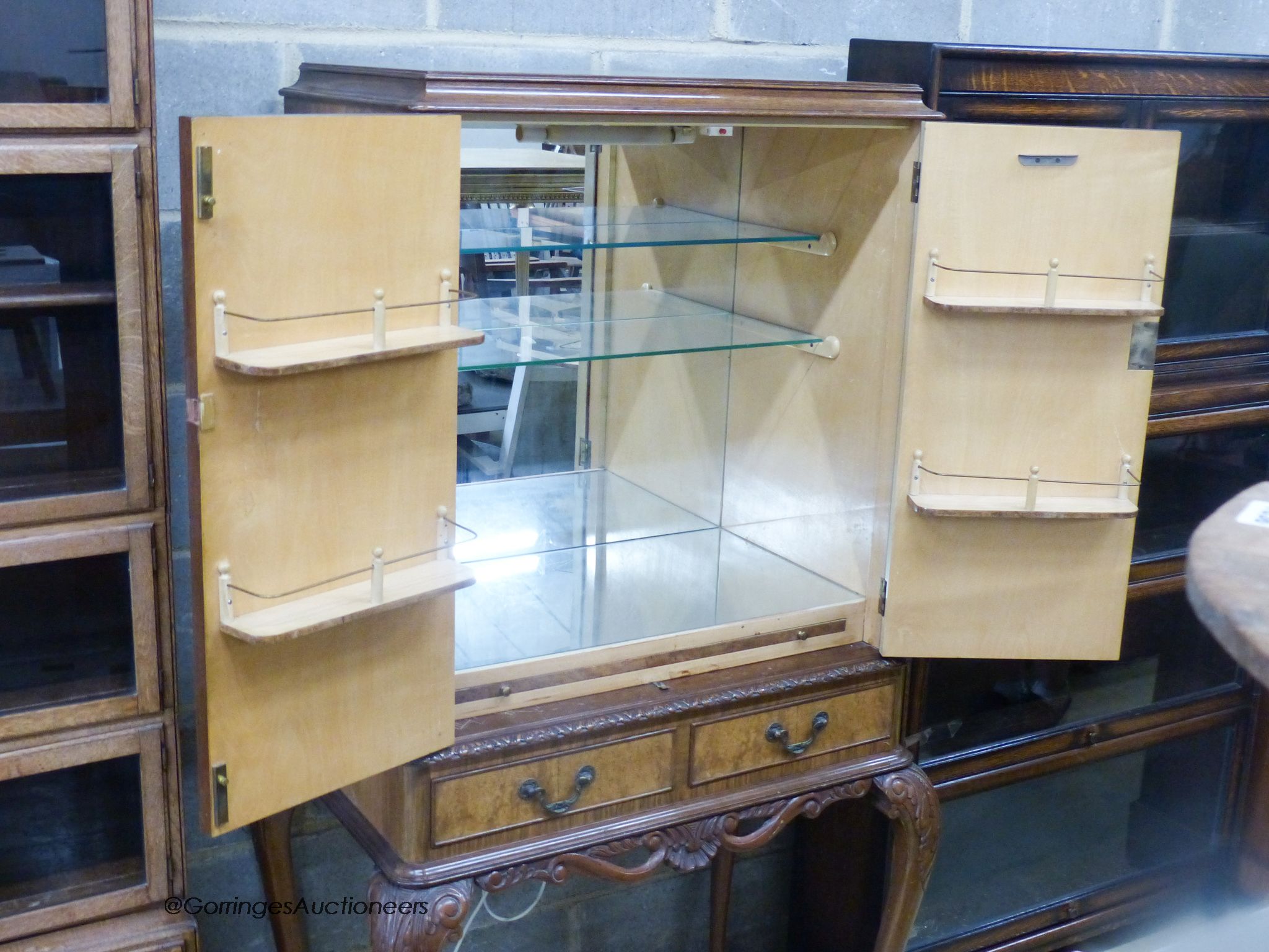A Queen Anne style brass mounted walnut veneered bar cabinet on stand, width 84cm, depth 53cm, height 156cm